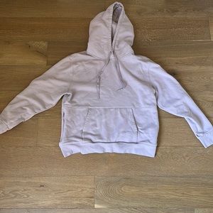 Athleta hoodie with full pocket and zipper pocket. light purple color